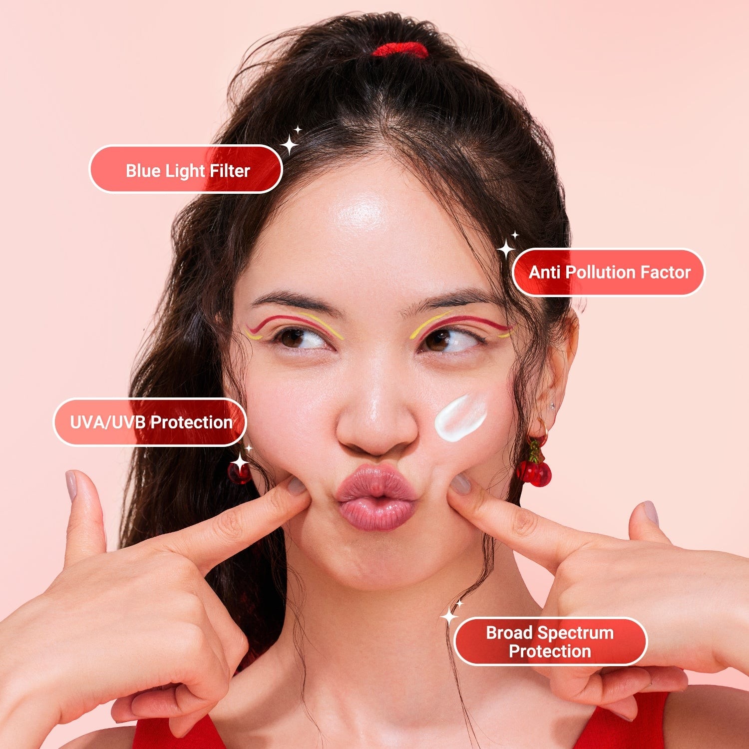 Woman pointing to her face with text labels on a pink background