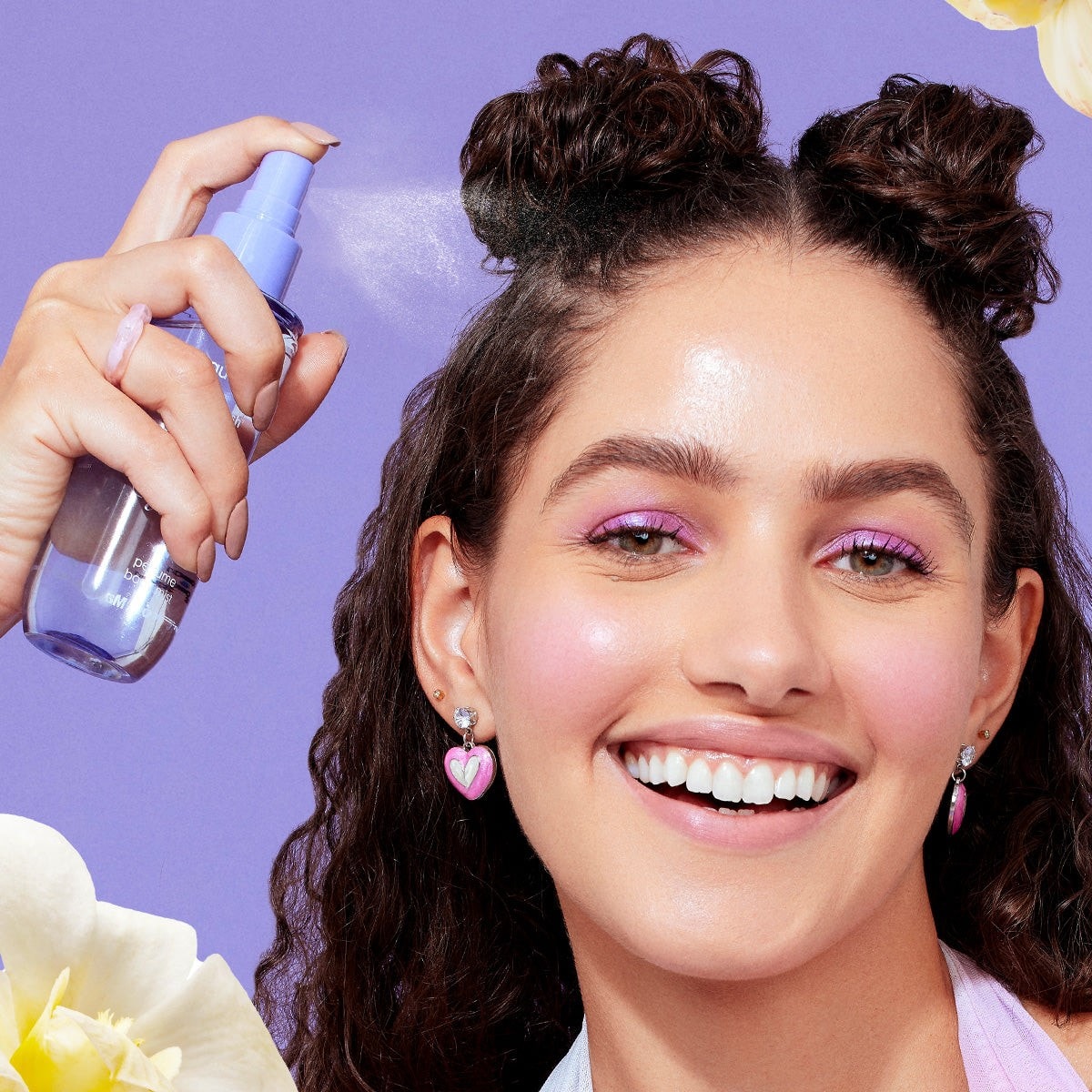 Applying Aqualogica vanilla perfume 